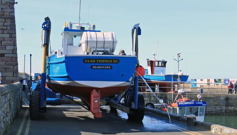 26 March 2017 - Seahouses boat lift © Ian Foster / fozimage