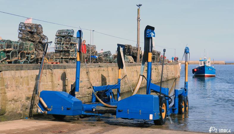 26 March 2017 - Seahouses boat lift © Ian Foster / fozimage